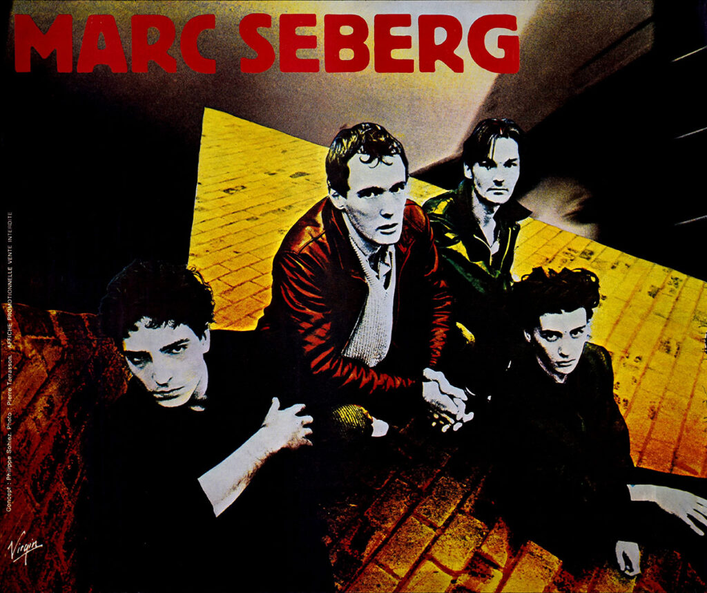 1983-Marc-Seberg-Affiche01-775-925-imprimee-Oreille-est-Hardie-Copie-1024x858 Marc Seberg
