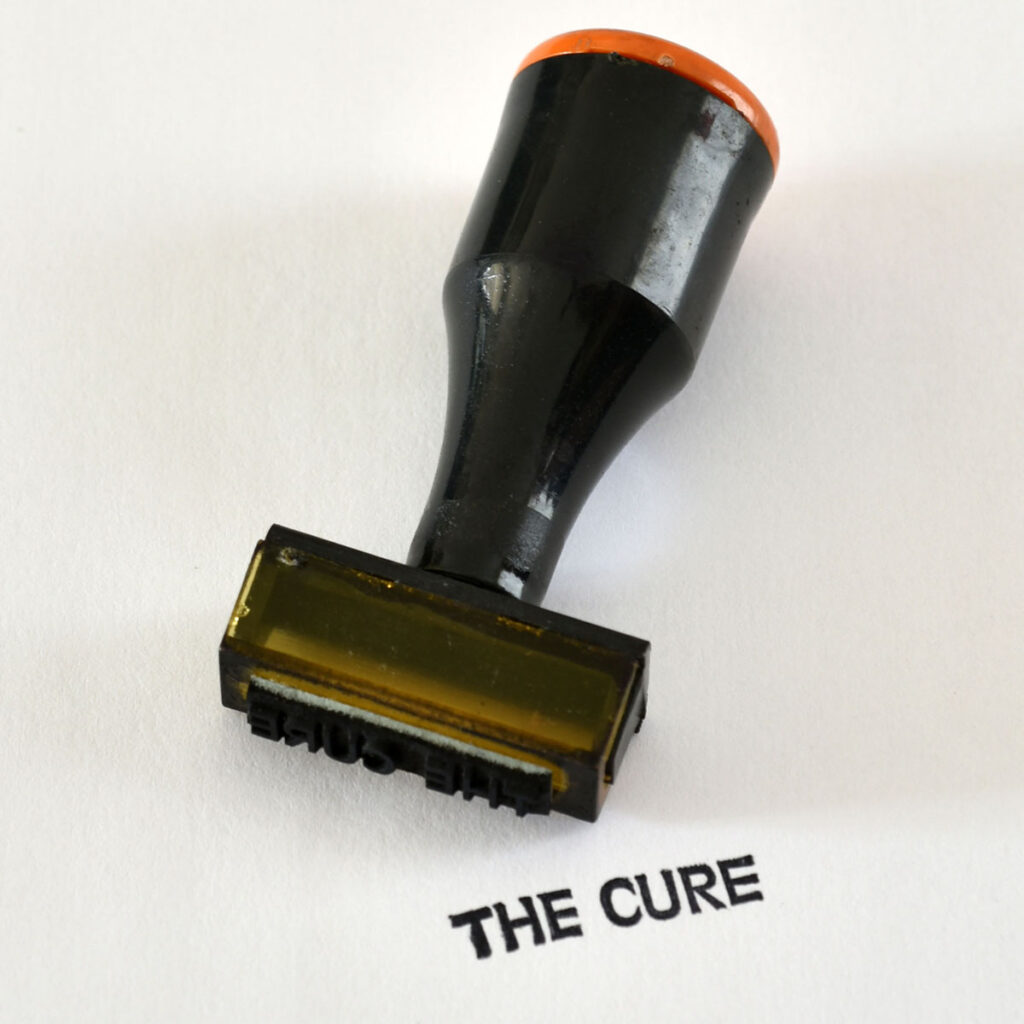Cure-Tampon01-Oreille-est-Hardie-1024x1024 NEGATIF : Tampons et contremarques du Confort Moderne