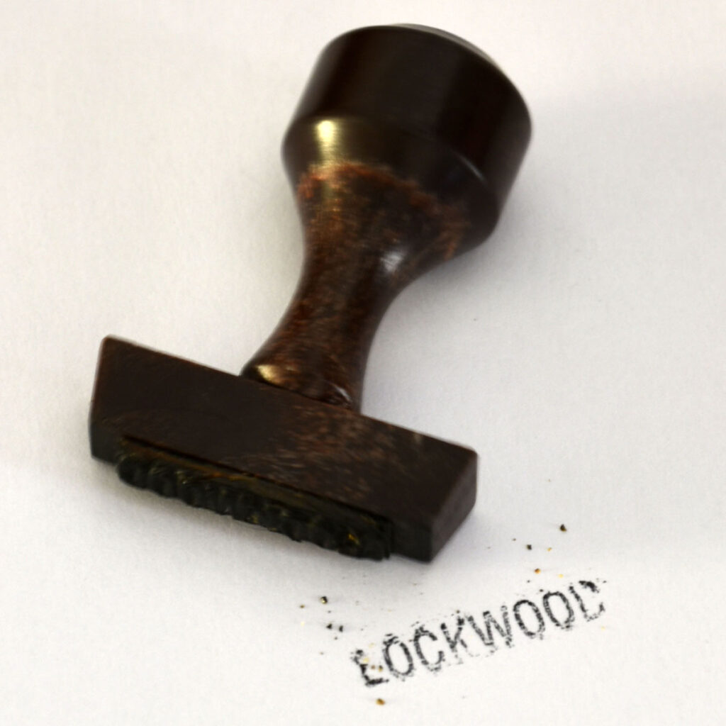 Lockwood-Tampon01-Oreille-est-Hardie-1024x1024 NEGATIF : Tampons et contremarques du Confort Moderne